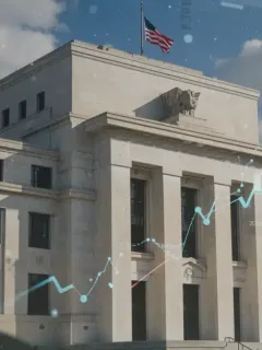 Federal Reserve building with rising interest rate graph and 2026 calendar, symbolizing economic outlook changes.